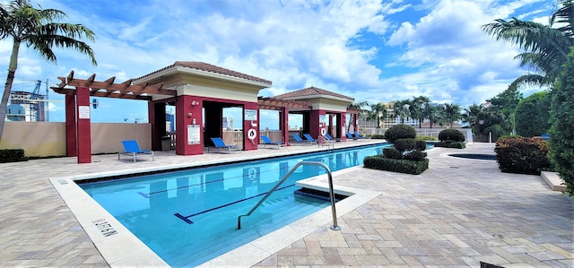 view of pool featuring a pergola and a patio area