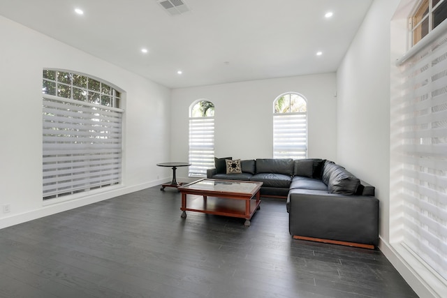 living room with dark wood-type flooring