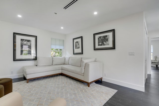 460 Surfside Ln, Juno Beach, FL 33408 - living room featuring plenty of natural light, baseboards, wood finished floors, and recessed lighting