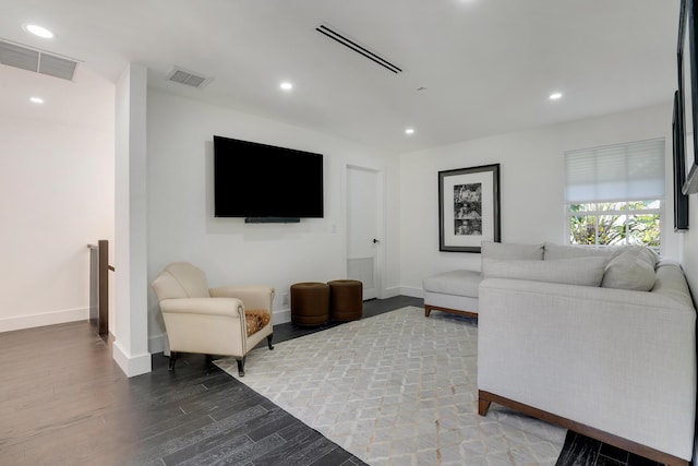 460 Surfside Ln, Juno Beach, FL 33408 - living area featuring wood finished floors, baseboards, and recessed lighting