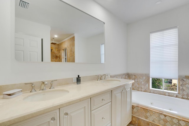 bathroom with vanity and plus walk in shower