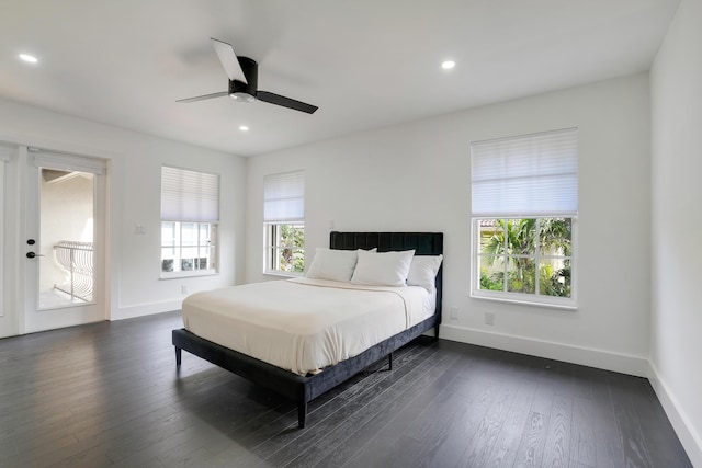 bedroom featuring ceiling fan and dark hardwood / wood-style floors