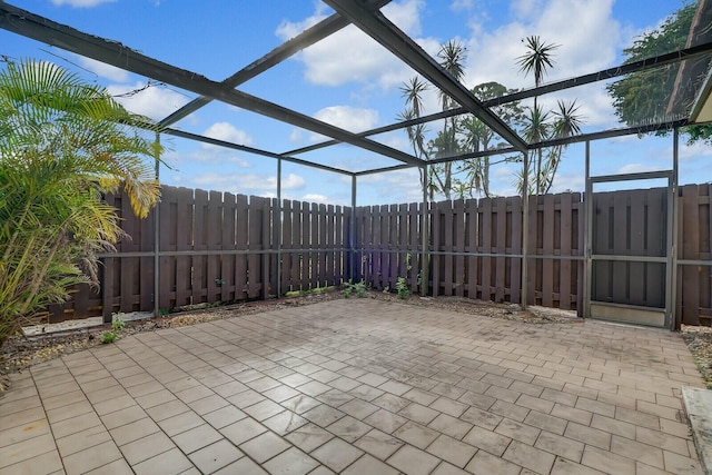 view of patio / terrace with glass enclosure