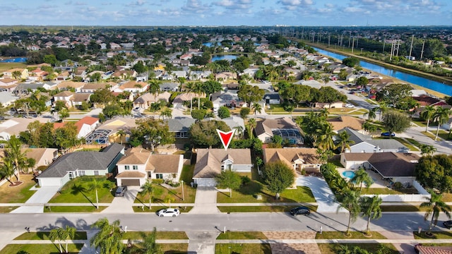 bird's eye view with a water view