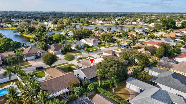 drone / aerial view featuring a water view