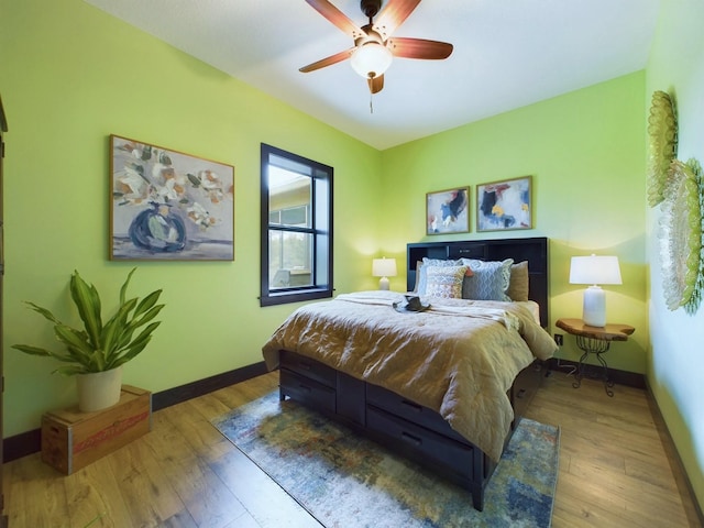 bedroom featuring ceiling fan and wood-type flooring