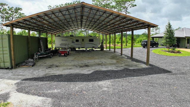 view of car parking featuring a carport