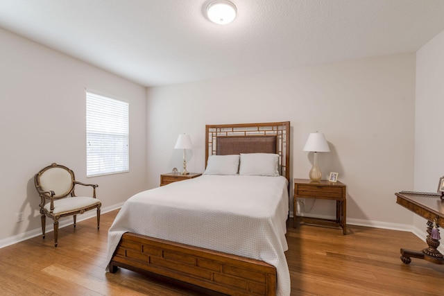 bedroom featuring light wood-type flooring