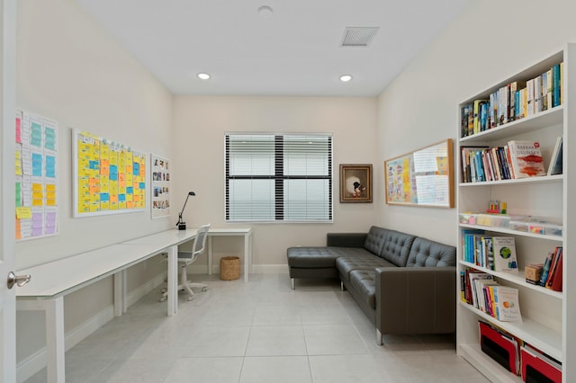 living area with light tile patterned flooring