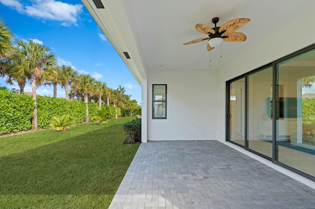 view of patio featuring ceiling fan