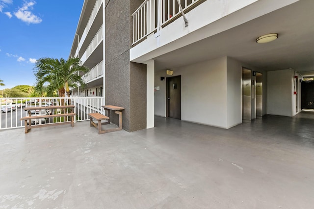 view of patio / terrace featuring elevator