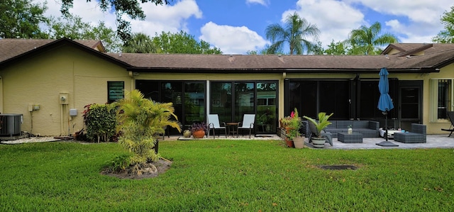 back of property featuring cooling unit, a patio area, an outdoor hangout area, and a yard