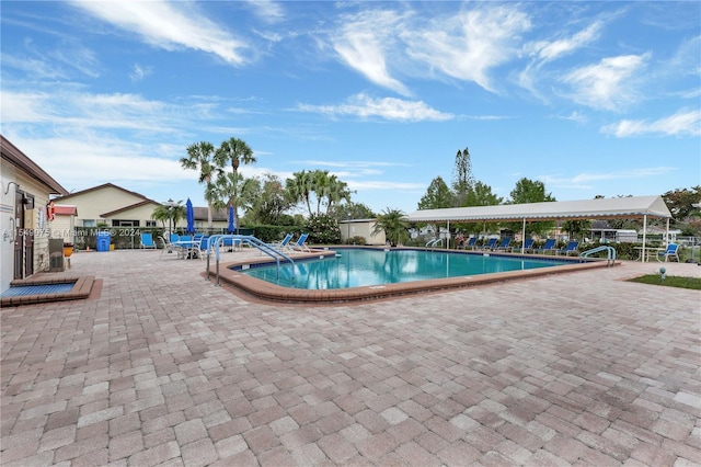 view of pool featuring a patio