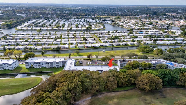 8205 NW 61st St Unit B303, Tamarac, FL 33321 - aerial view of property and surrounding area with a large body of water, a golf club, and nearby suburban area