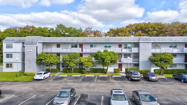 8205 NW 61st St Unit B303, Tamarac, FL 33321 - view of property with uncovered parking