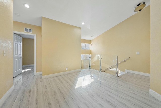 empty room with light wood-type flooring