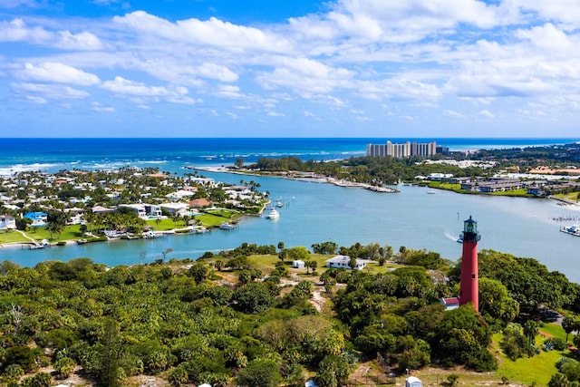 birds eye view of property featuring a water view