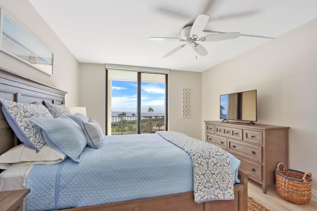 bedroom with access to exterior and ceiling fan