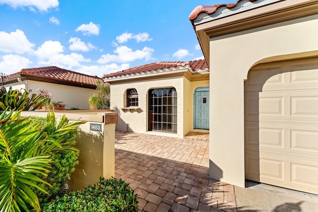 view of patio / terrace with a garage