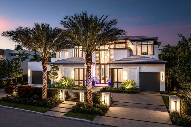 view of front of property with a garage