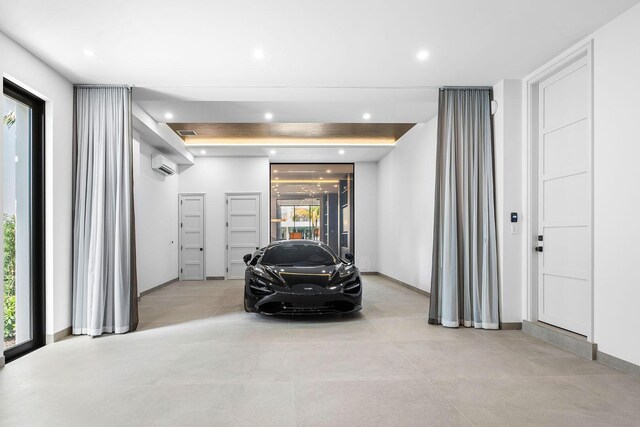 garage with a wall mounted AC