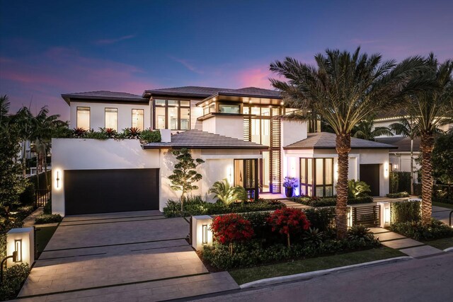 view of front of property featuring a garage