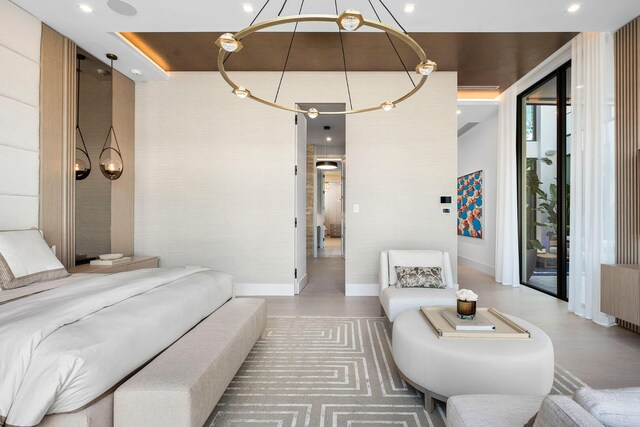 bathroom with tile patterned flooring, vanity, a shower with shower door, and tile walls