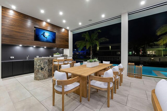 dining space with light tile patterned floors