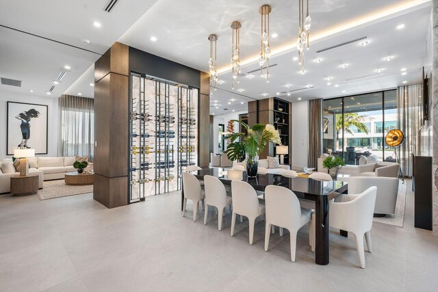 dining space with a wall of windows