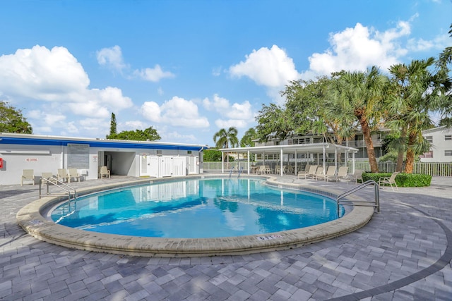 view of pool featuring a patio area