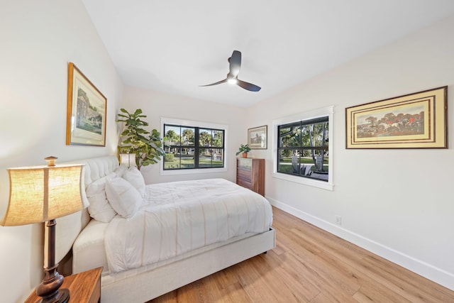 bedroom featuring ceiling fan and light hardwood / wood-style floors