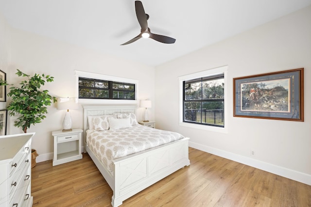 bedroom featuring ceiling fan and light hardwood / wood-style flooring