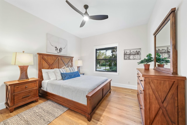 bedroom featuring ceiling fan and light wood-type flooring