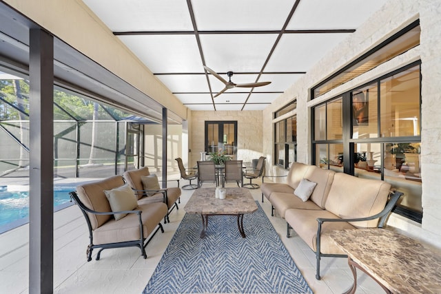 sunroom / solarium with ceiling fan