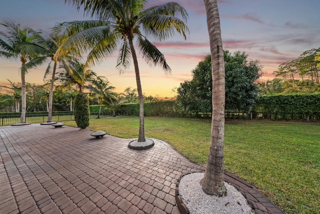 patio terrace at dusk with a lawn