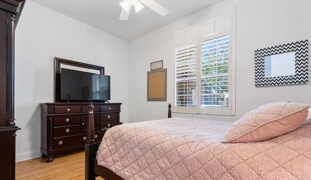 bedroom featuring ceiling fan and light wood-type flooring