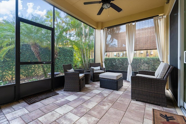 sunroom / solarium with ceiling fan