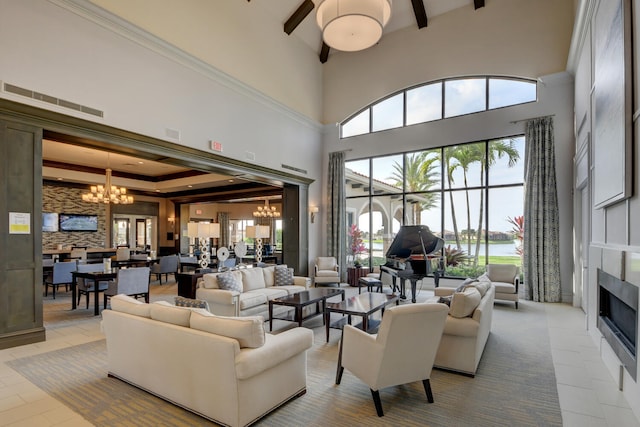 tiled living room with beamed ceiling, a towering ceiling, and a chandelier