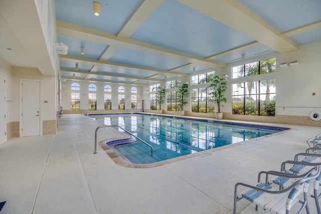 view of swimming pool featuring a patio area