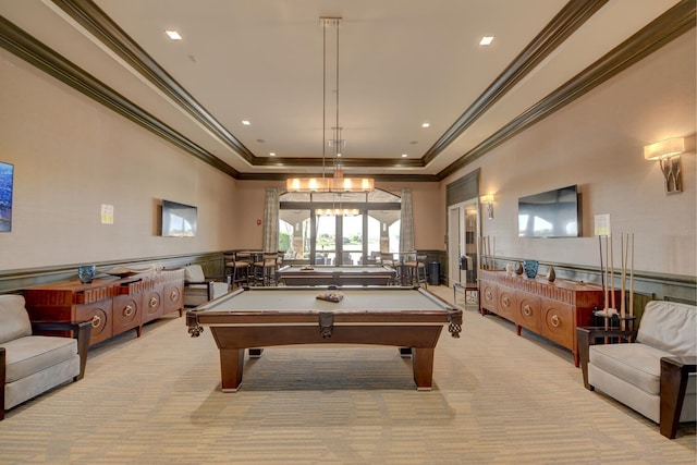 rec room with light carpet, a high ceiling, ornamental molding, and pool table