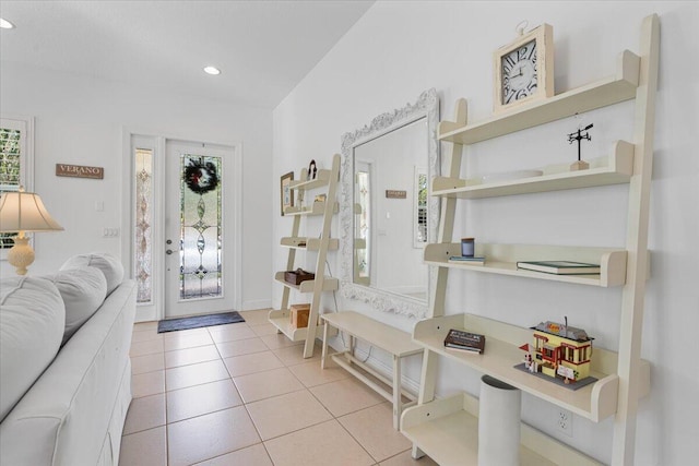 entryway with light tile patterned floors