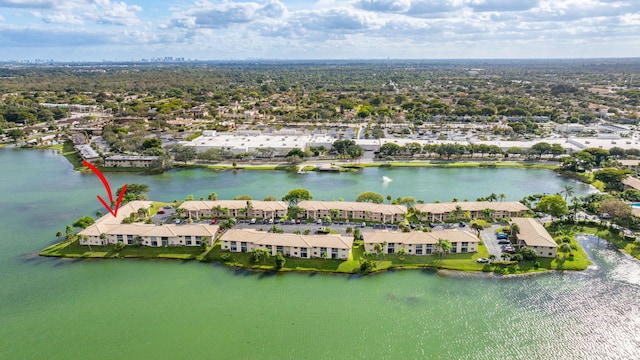 drone / aerial view with a water view