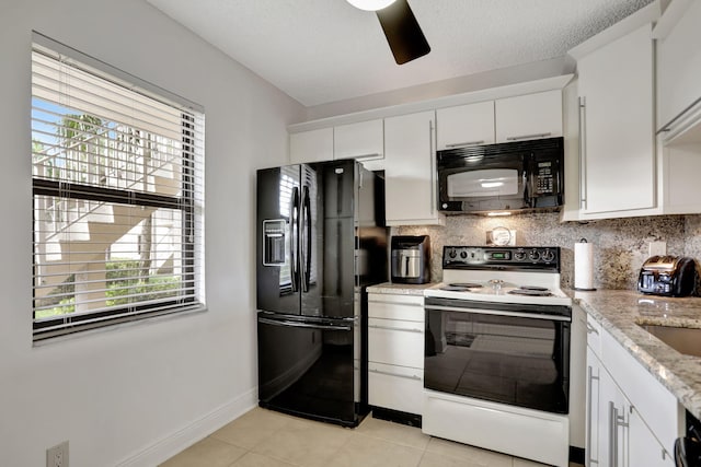 kitchen featuring backsplash, black appliances, white cabinets, light stone countertops, and light tile patterned floors