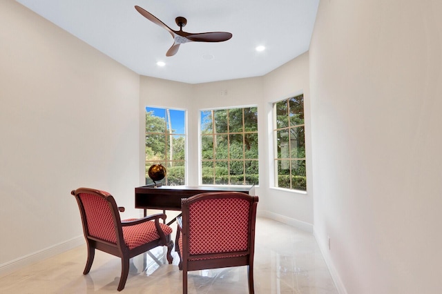 dining space with ceiling fan and a wealth of natural light