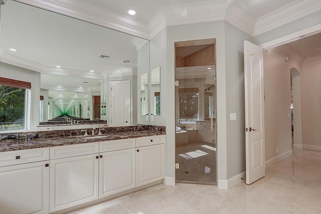 bathroom featuring vanity, walk in shower, and crown molding