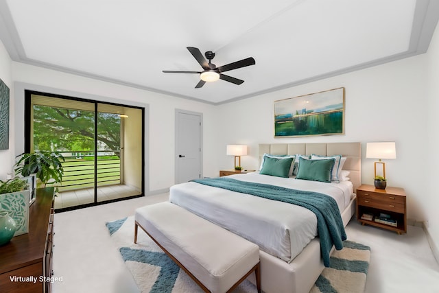 carpeted bedroom with access to exterior, ceiling fan, and ornamental molding