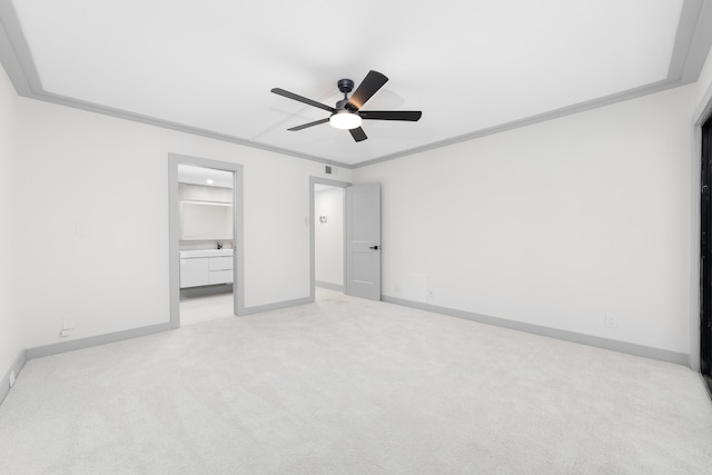 unfurnished bedroom with ceiling fan, ornamental molding, and light carpet