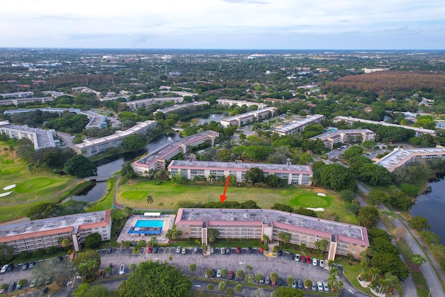 drone / aerial view with a water view