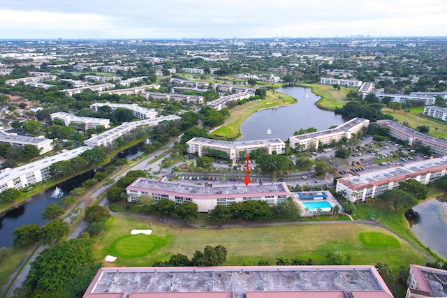 drone / aerial view featuring a water view