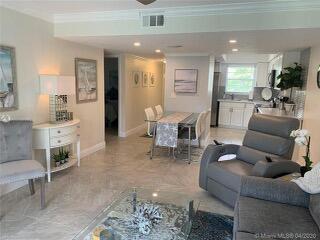 living room featuring ornamental molding